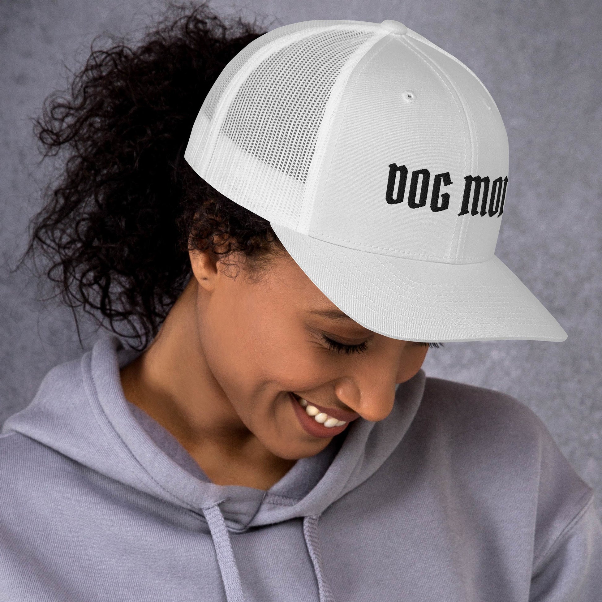Model in Dog mom trucker hat made for German Shepherd lovers and owners, white color - GSD Colony