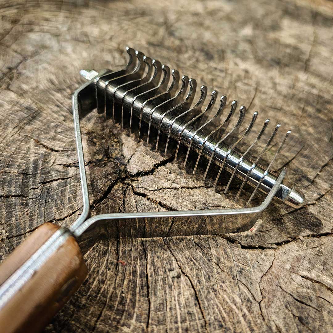Wooden stainless steel grooming dog brush
