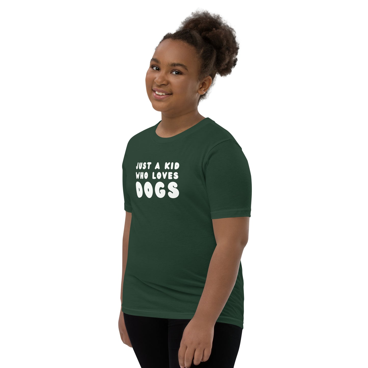 Model in Just a kid who loves dogs kid tshirt for German Shepherd lovers, green color - GSD Colony