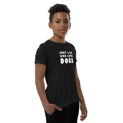 Model in Just a kid who loves dogs kid tshirt for German Shepherd lovers, black color - GSD Colony