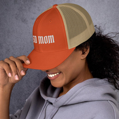 Model  in GSD Mom trucker hat made for German Shepherd lovers and owners, orange color - GSD Colony