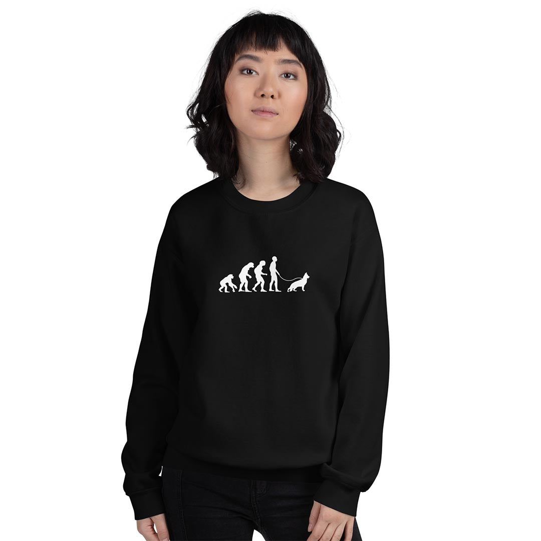 Woman in Human Evolution sweatshirt for German Shepherd lovers and owners, black color - GSD Colony