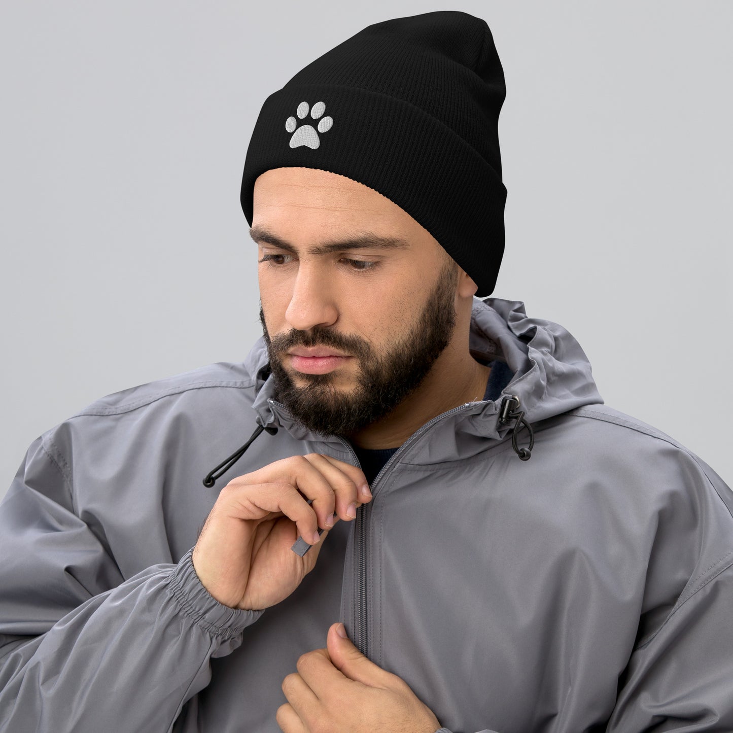 Model wearing Paw Beanie hat for German Shepherd lovers and owners, black color - GSD Colony