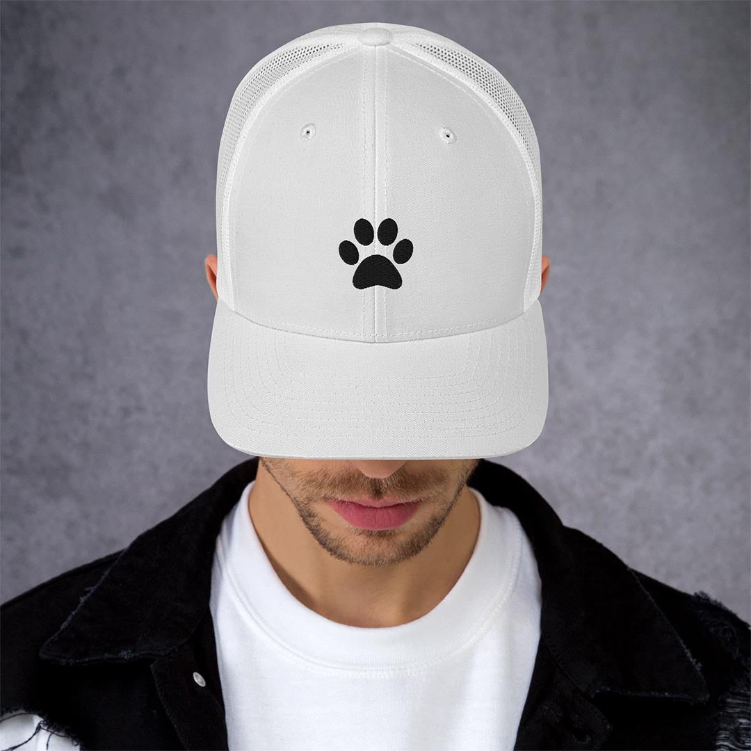 Model in Paw print trucker cap made for German Shepherd lovers and owners, white color - GSD Colony